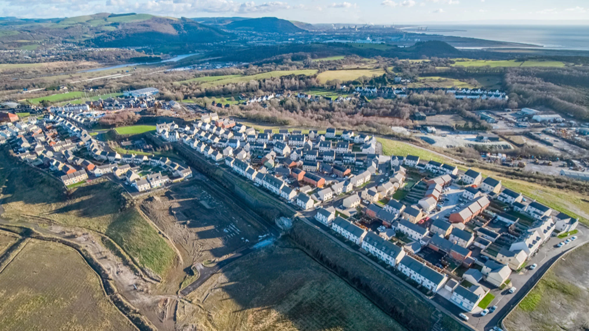 An aerial view of the Coed Darcy village development in 2021